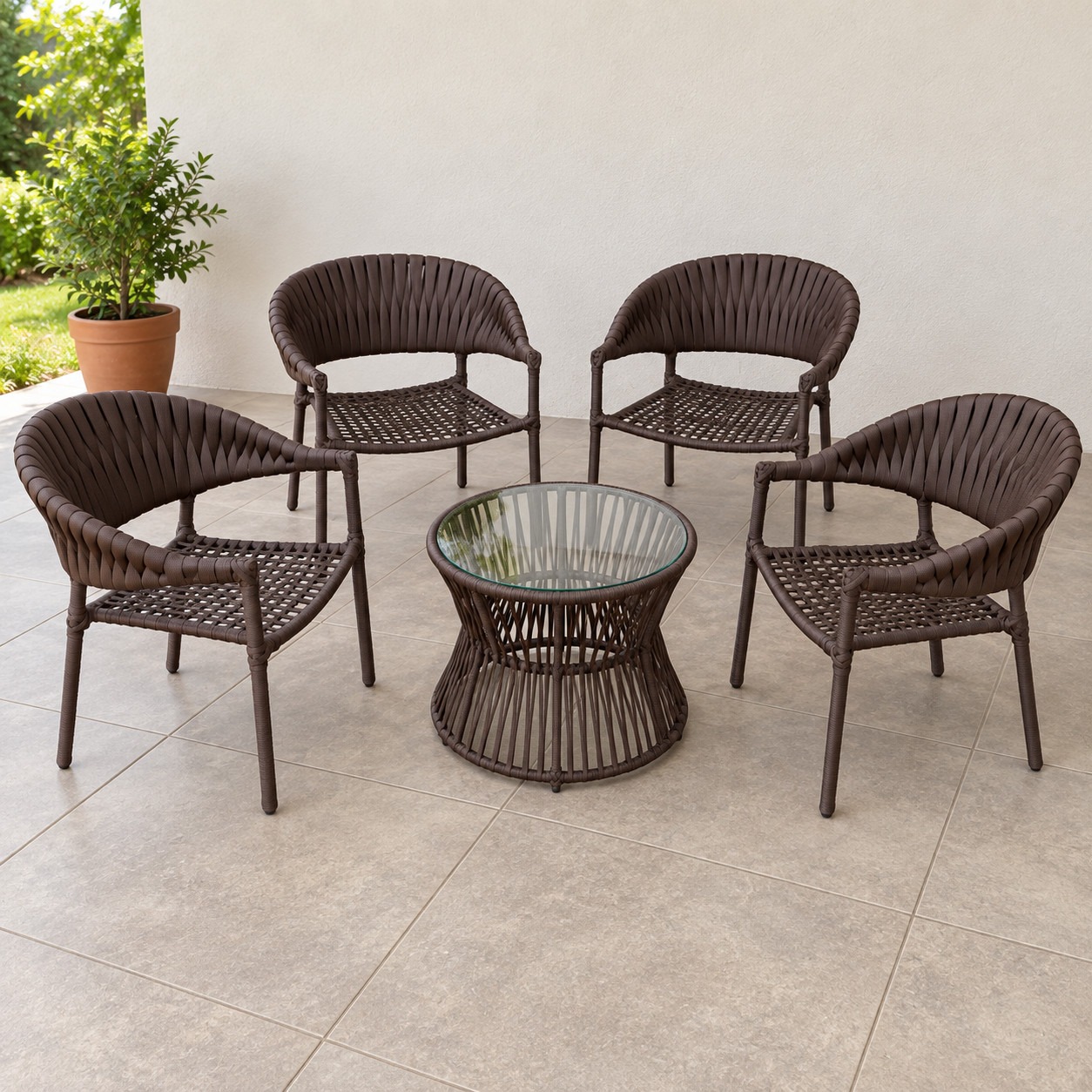 Juego exterior Tulum: 4 sillas de cuerda náutica con la mesa baja de vidrio