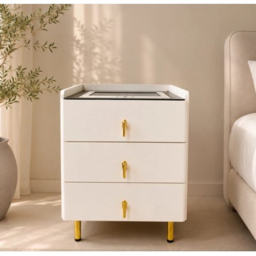 Mesita de luz Linus off white al lado de la cama