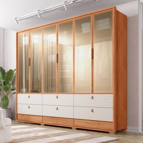 Ropero Evolution Reflex con puertas de vidrio en un dormitorio